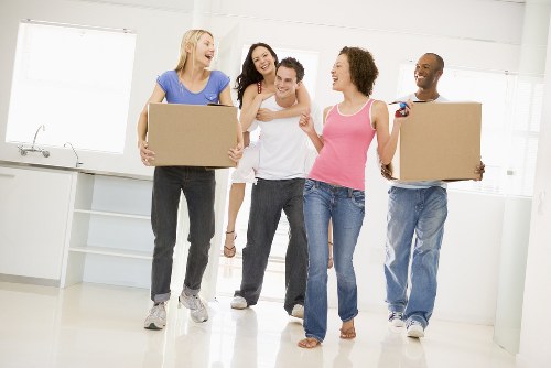 Professional local removals team in Aperfield loading moving boxes